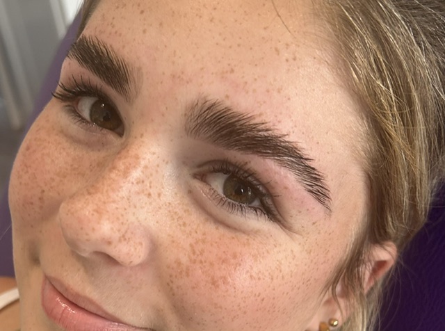 Feathered brow detail close-up