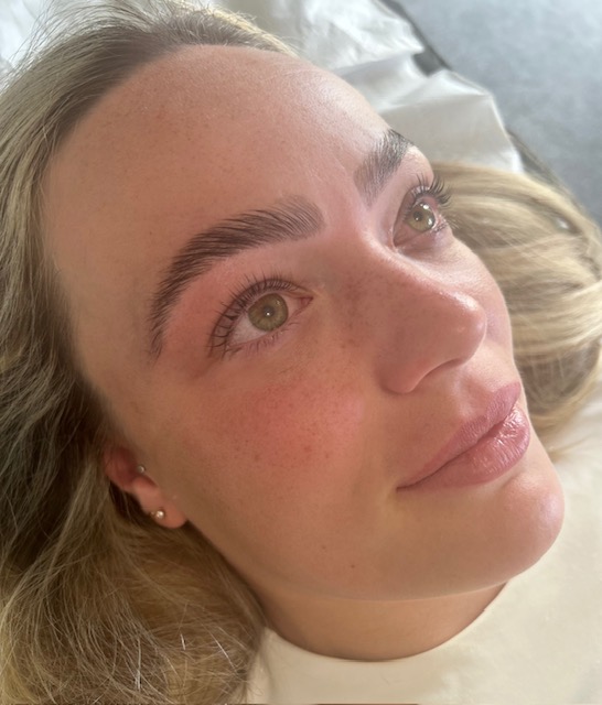 Brow lamination, freckled complexion